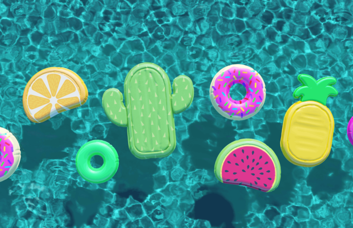 Sommer_Schwimmbad_voller_lustiger_Schwimmhilfen. Bis zu 30 % IHG One Rewards Rabatt auf Hotelaufenthalte sichern.